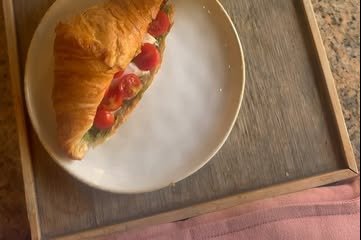 Filled croissant on a plate
